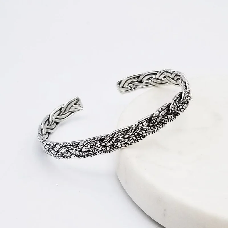 BRAIDED CUFF WITH TINY CIRCLE STAMPS