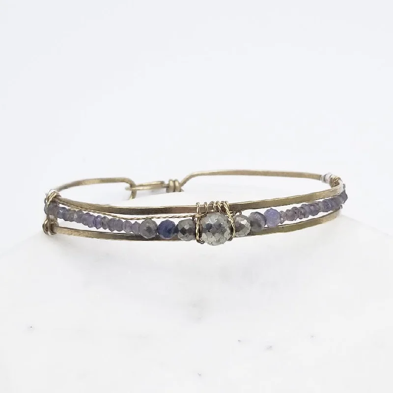 HAND FORMED BRASS CHANNEL BRACELET WITH PYRITE AND IOLITE